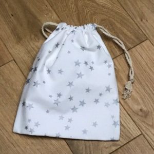 Petit sac Pochon blanc étoiles argentés