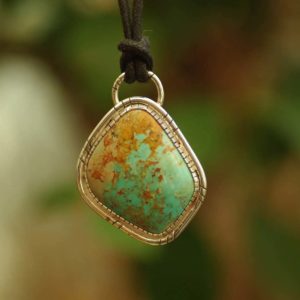 Pendentif en turquoise du Mexique serti argent 950